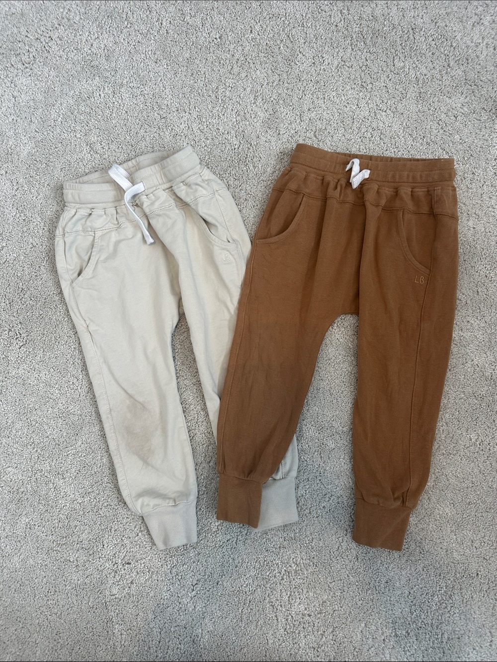 Two pairs of Little Bipsy joggers